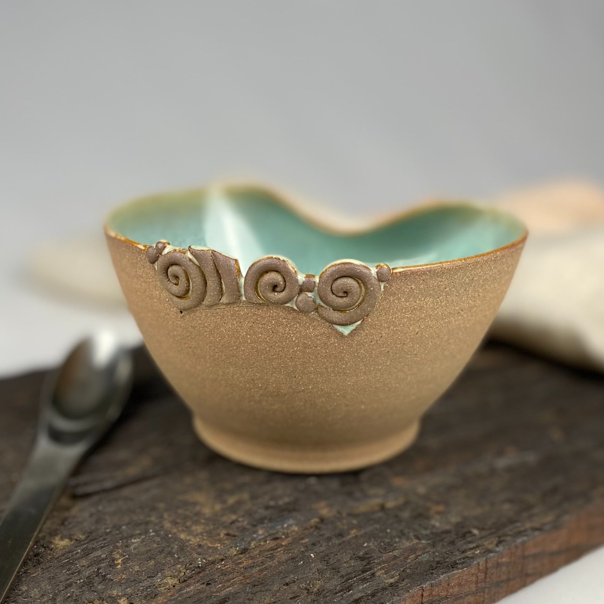 Handmade pottery comfort grip aqua bowl