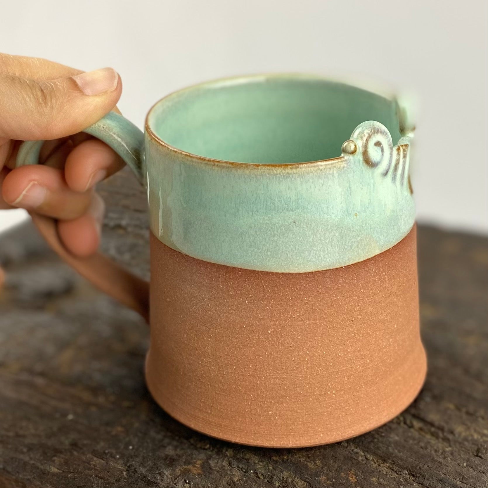 Aqua tea mug with comfortable handle