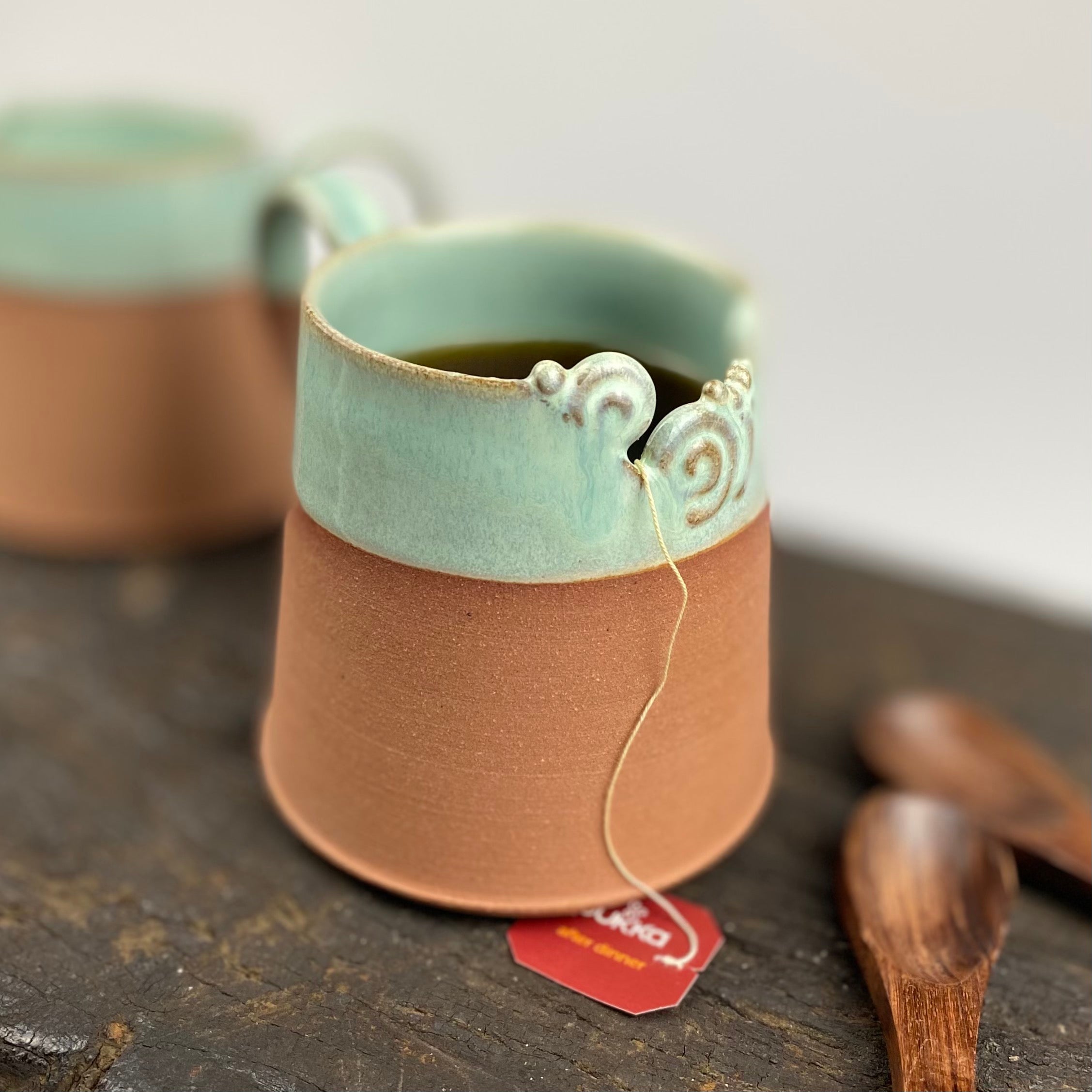 Handcrafted Pottery tea mug with notch