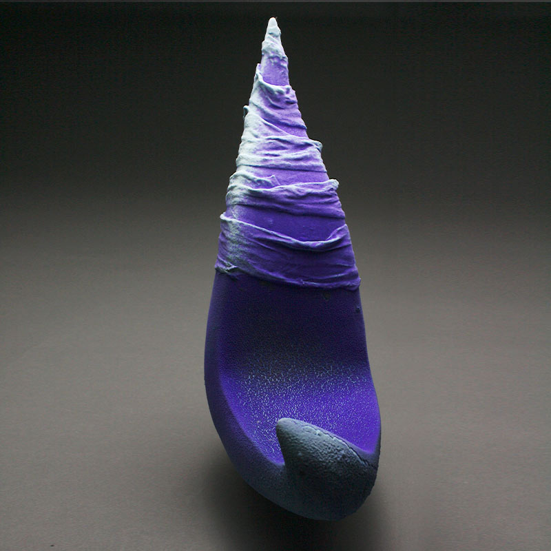 Aneela Dias-D'Sousa hand built sculpture called Vestige in stoneware clay with burn out fabric and bright purple glaze