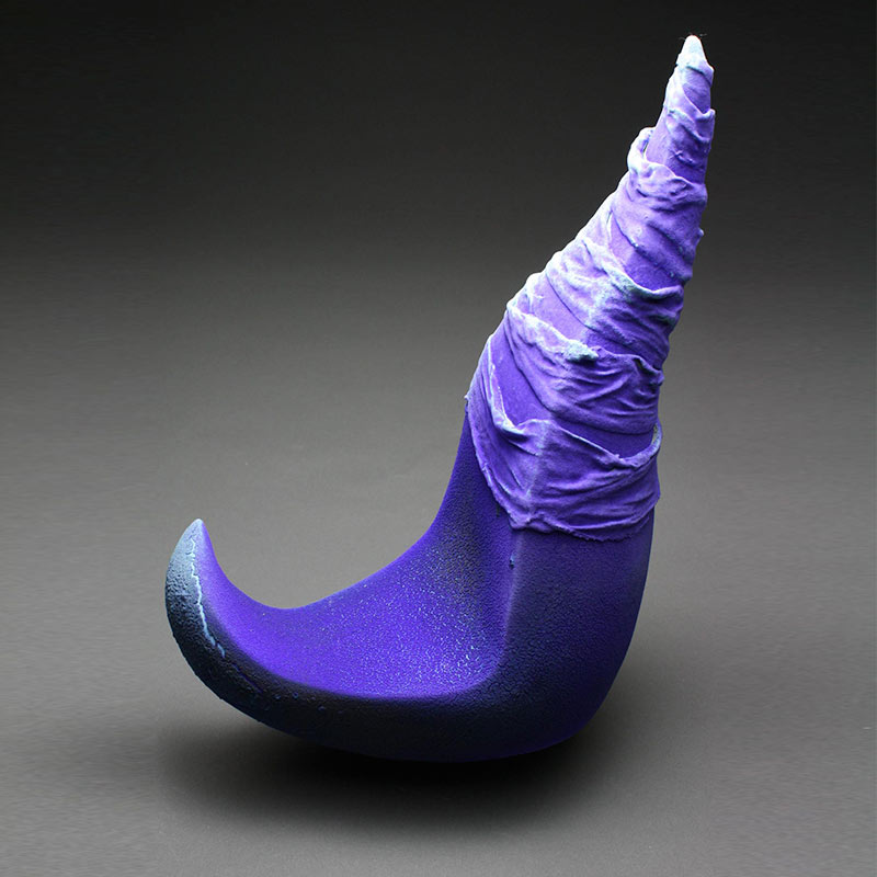 Aneela Dias-D'Sousa's sculpture called Vestige side view of hand built sculpture in stoenware with purple matte glaze